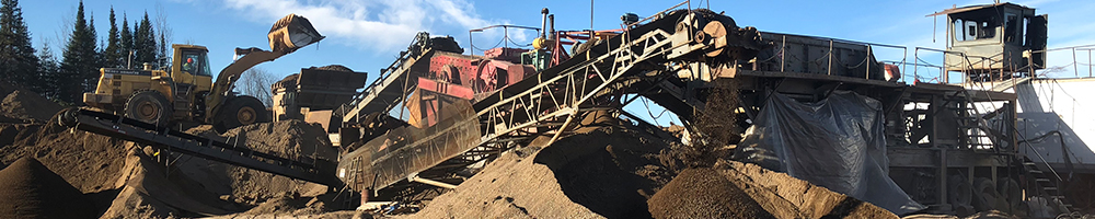 machines crushing rocks and stones