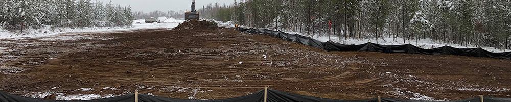 environmental tarps and soil spread working